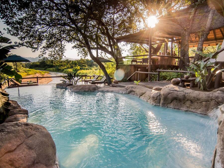 Outdoor pool, pool umbrellas, sun loungers