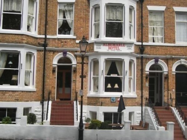 A corner building with a sign reading "Albemarle Hotel". - Albemarle Hotel (Scarborough)