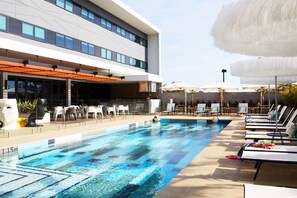 Outdoor pool, pool umbrellas, pool loungers
