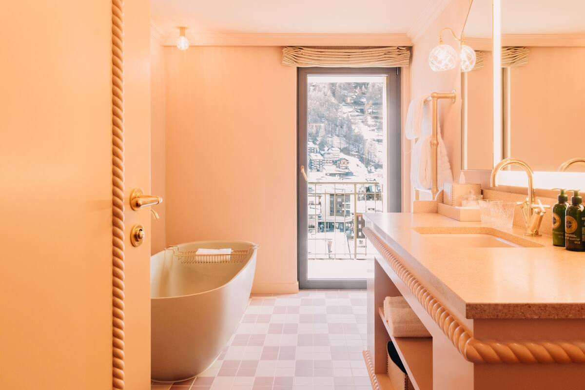 grand junior suite with matterhorn view | bathroom | free toiletries, hair dryer, bathrobes, slippers