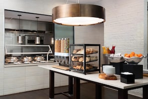 Daily buffet breakfast (USD 15 per person)