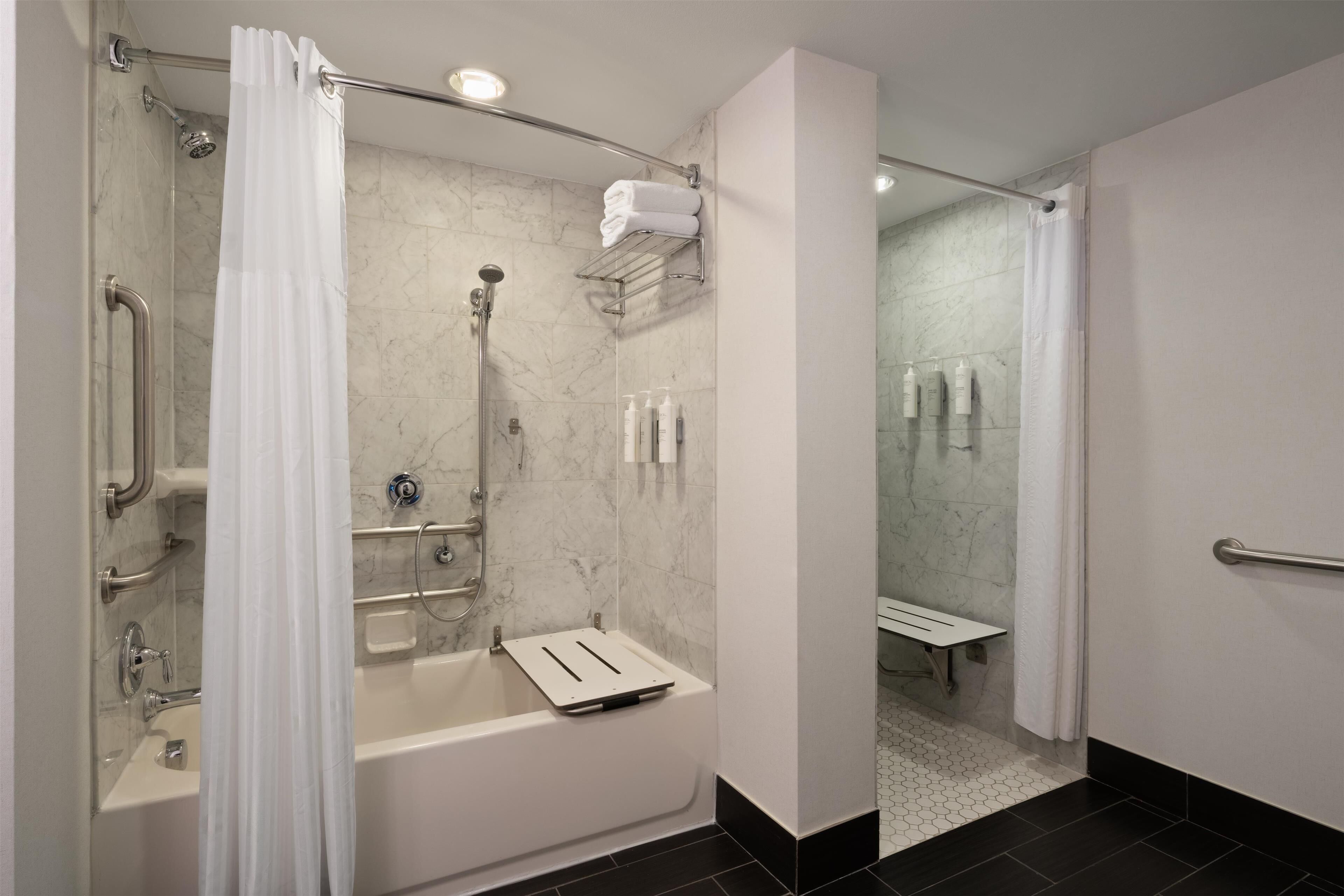 combined shower/bathtub, free toiletries, towels