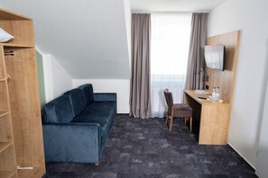 Dobbeltrom – comfort | Oppholdsområde | Flatskjerm-TV