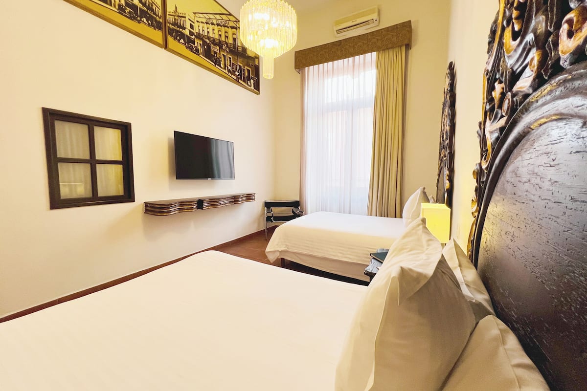 quadruple room | 1 bedroom, premium bedding, down duvets, in-room safe