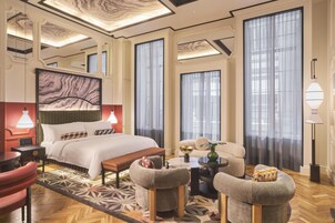 Premium bedding, down comforters, pillowtop beds, minibar