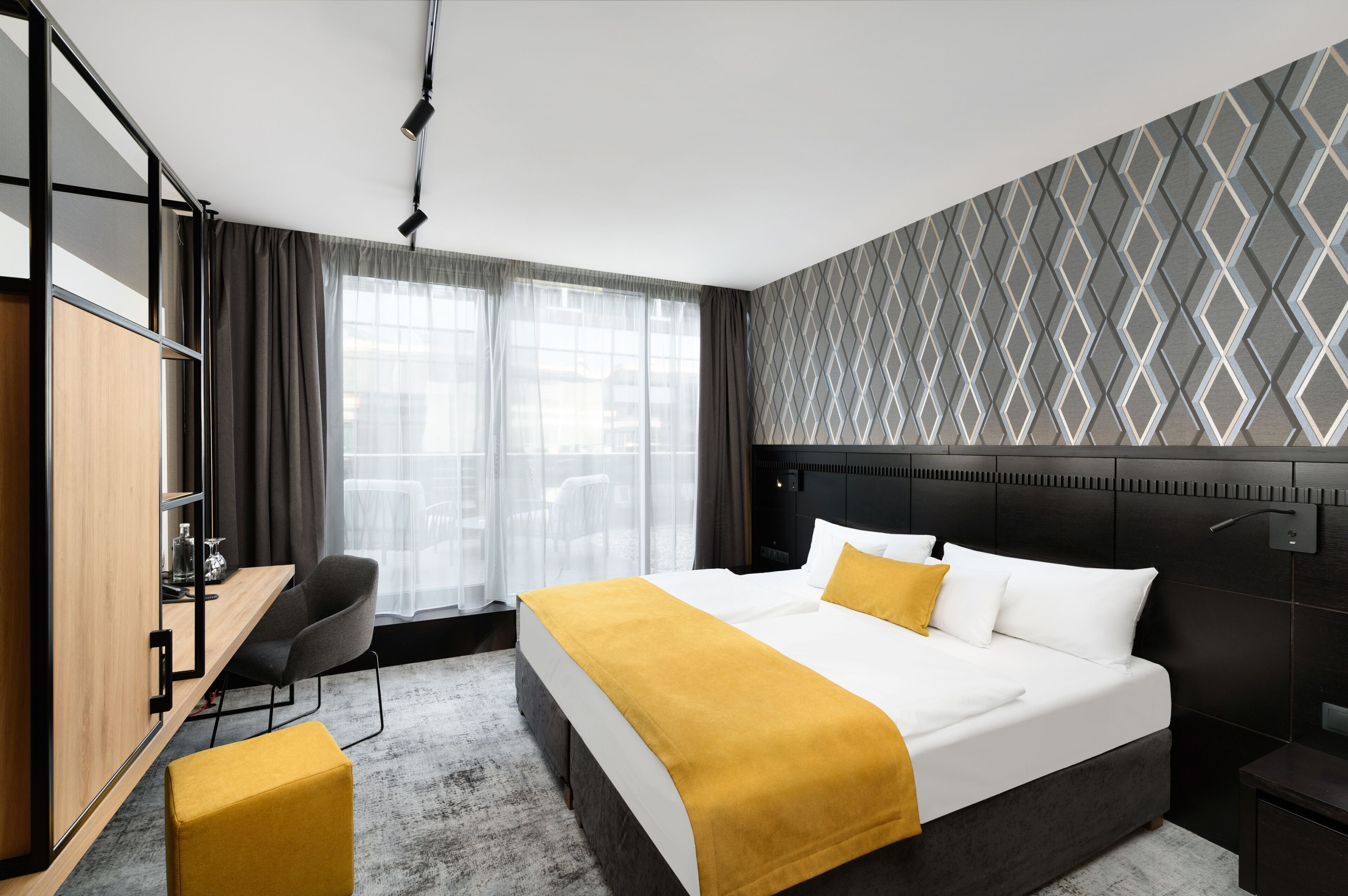 Hypo-allergenic bedding, in-room safe, desk, laptop workspace