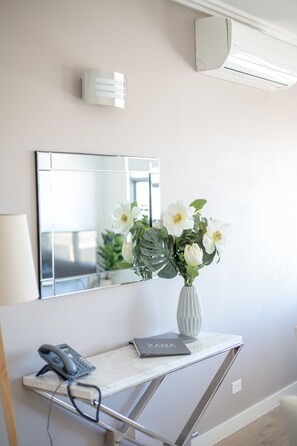 Apartment, 1 Bedroom | Living area | 50-inch Smart TV with cable channels, TV