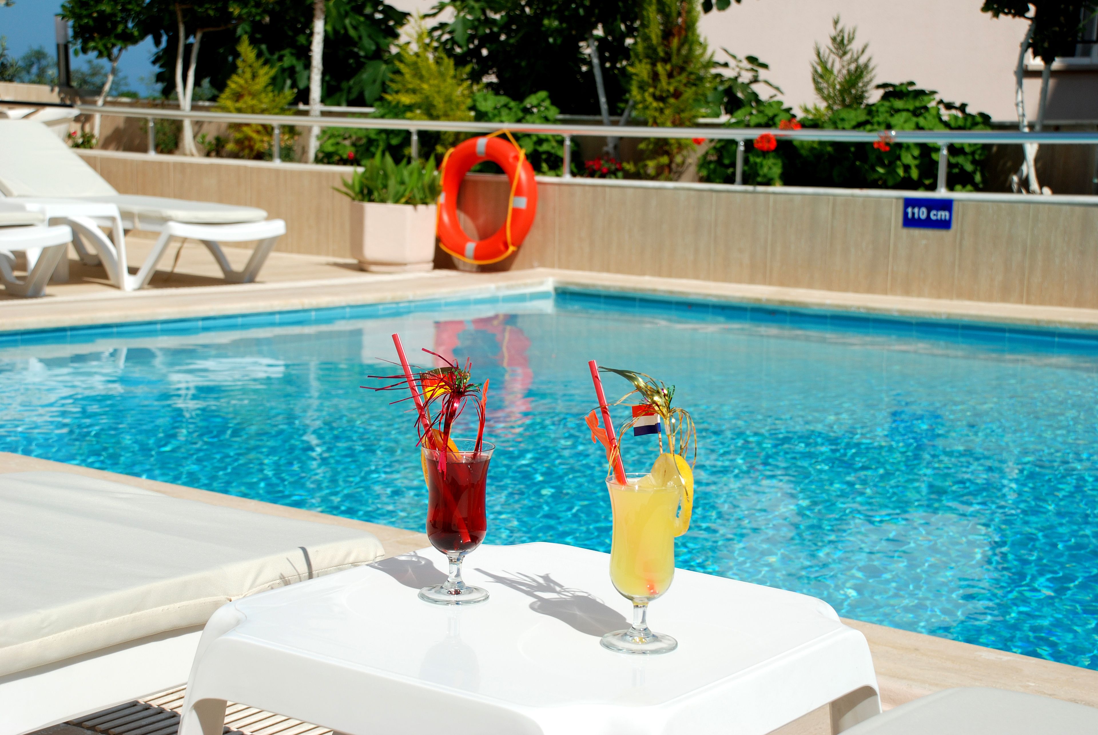 Outdoor pool, free cabanas, pool umbrellas