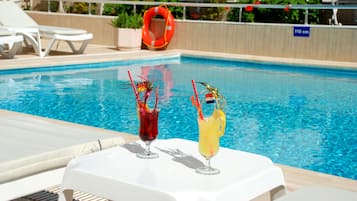 Outdoor pool, free pool cabanas, pool umbrellas
