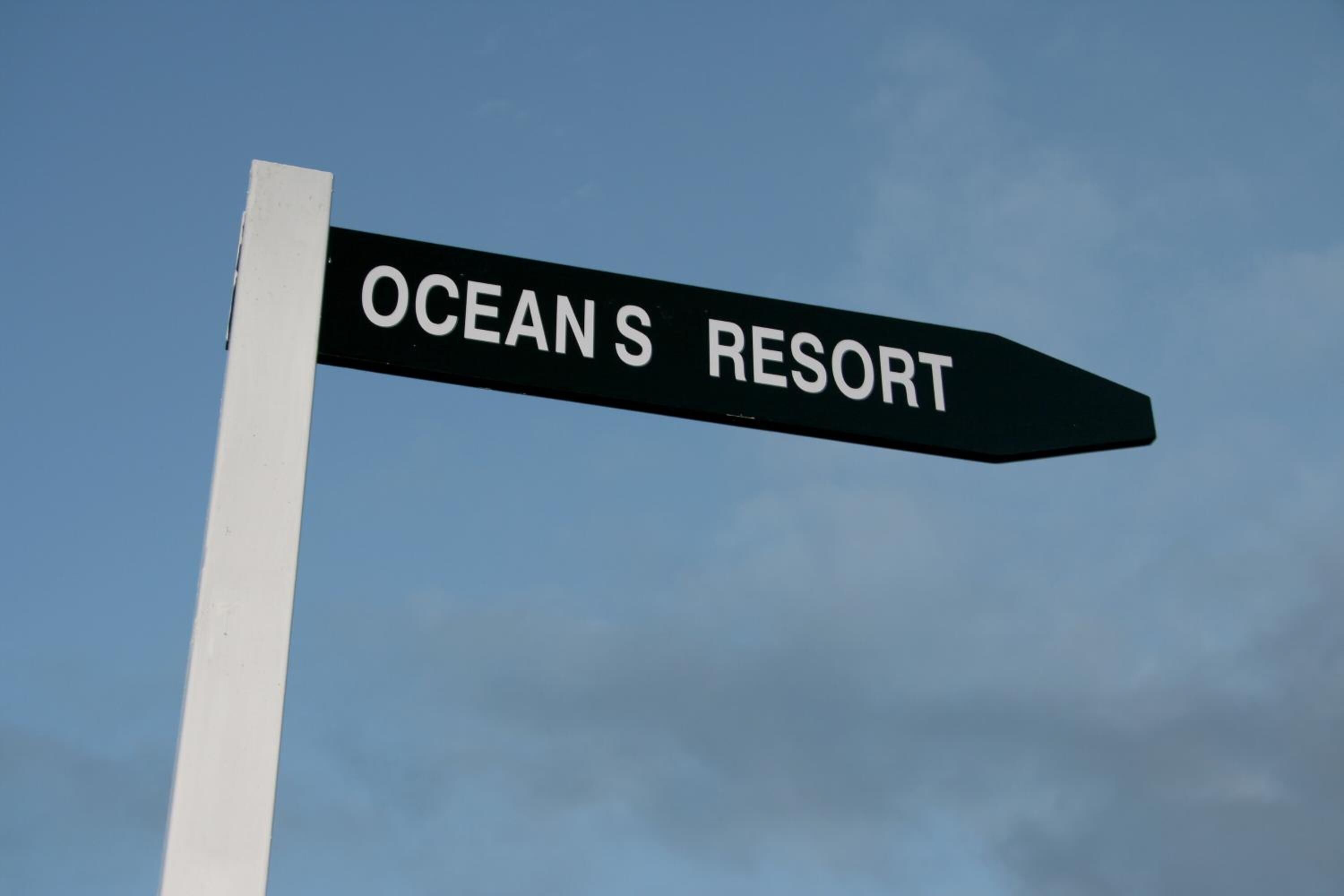 A street sign for Ocean's Resort.