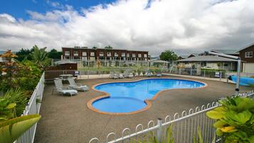 Outdoor pool, open 8:00 AM to 5:00 PM, pool loungers
