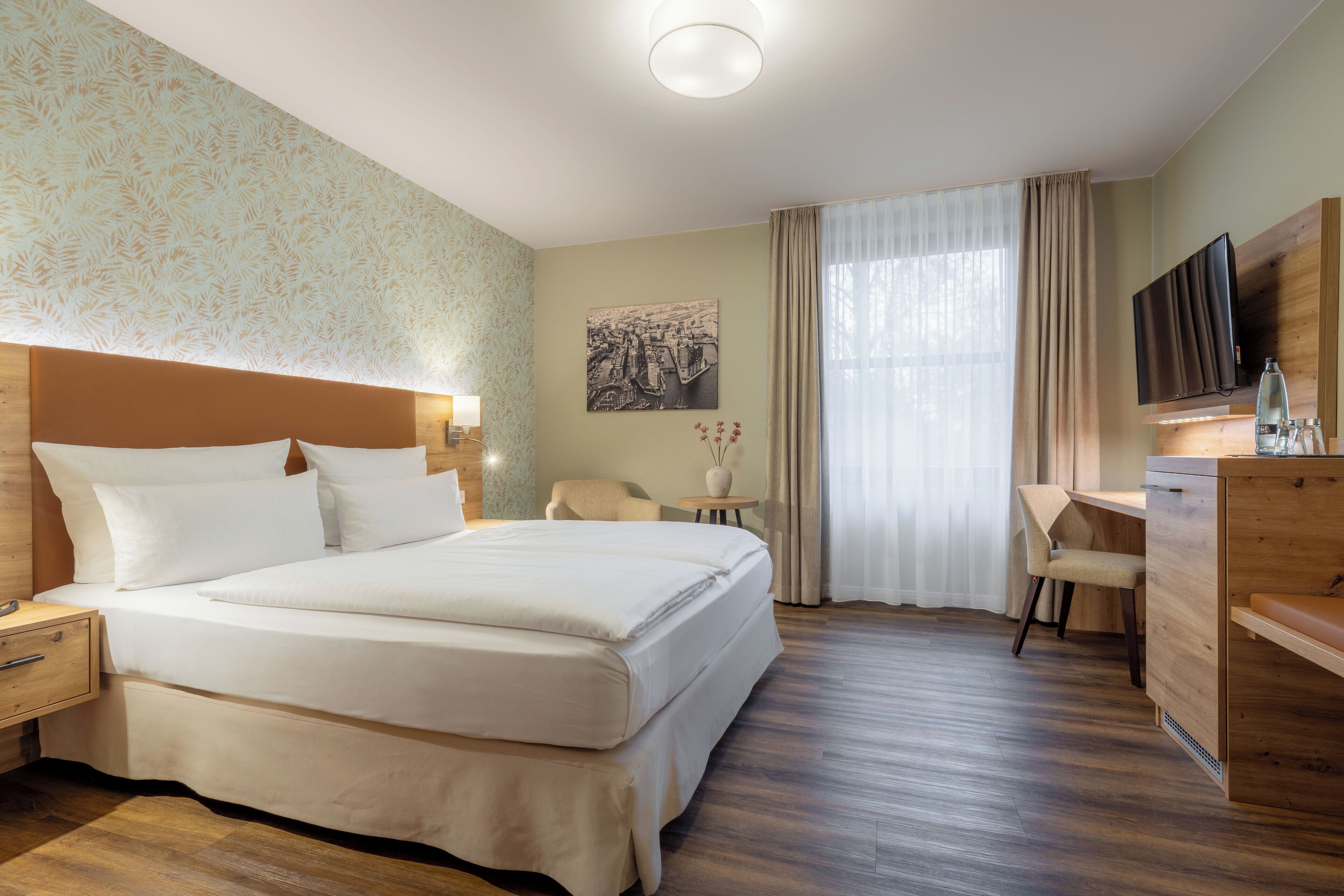 Habitación estándar | Ropa de cama hipoalergénica y minibar 