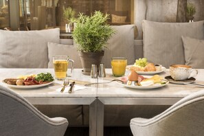 Daily buffet breakfast (EUR 28 per person)