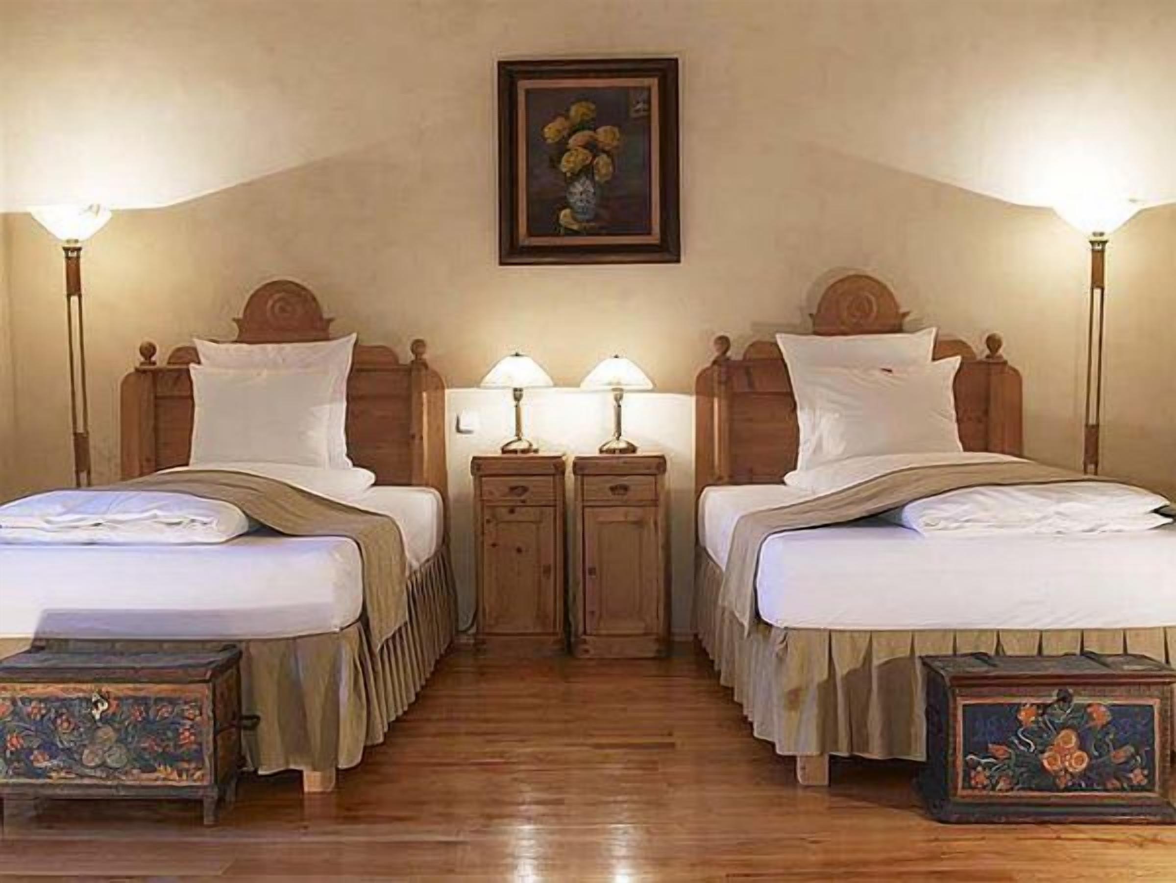 deluxe double or twin room | premium bedding, minibar, in-room safe, individually decorated