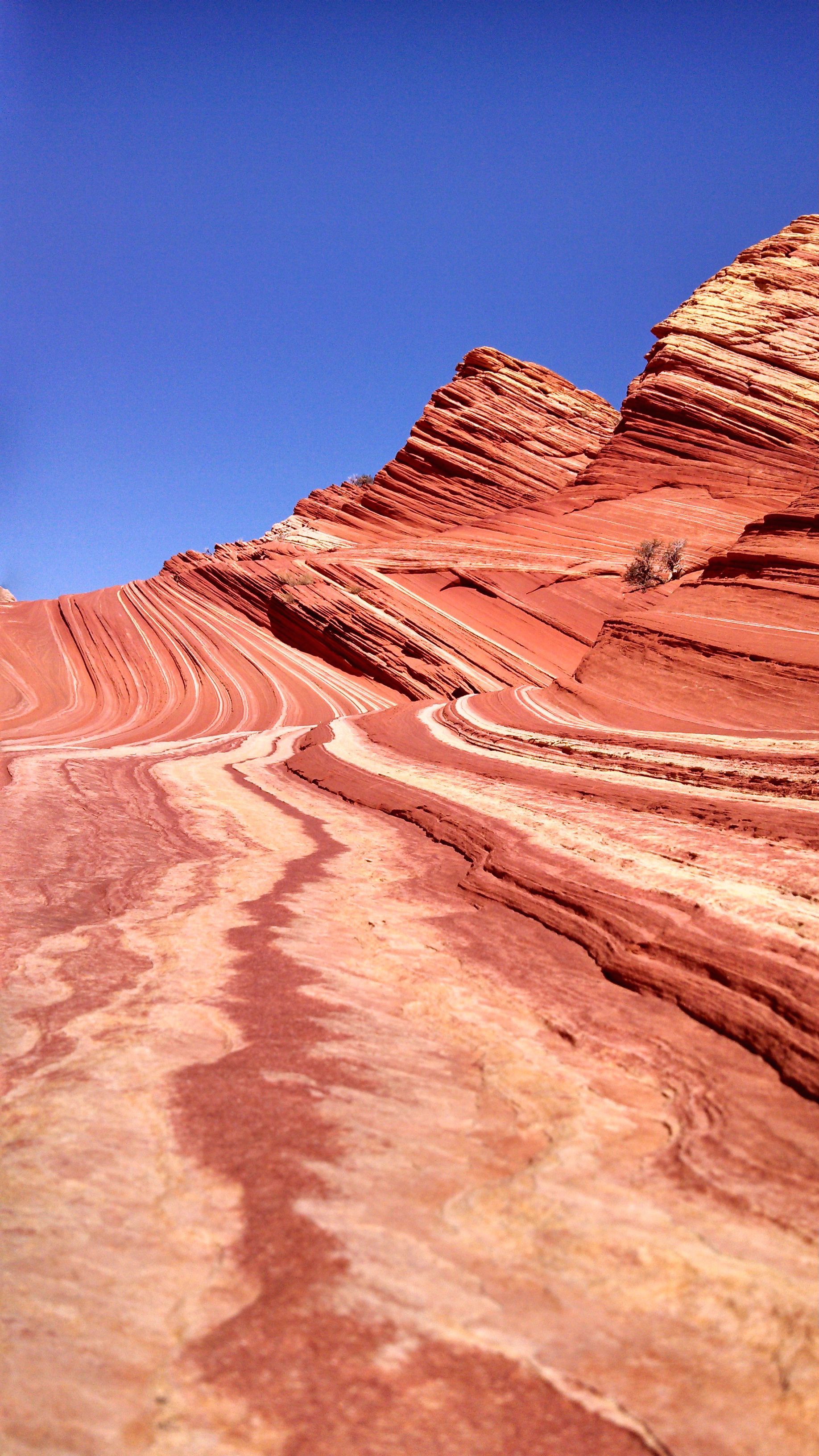 A layered rock formation with distinct strata.