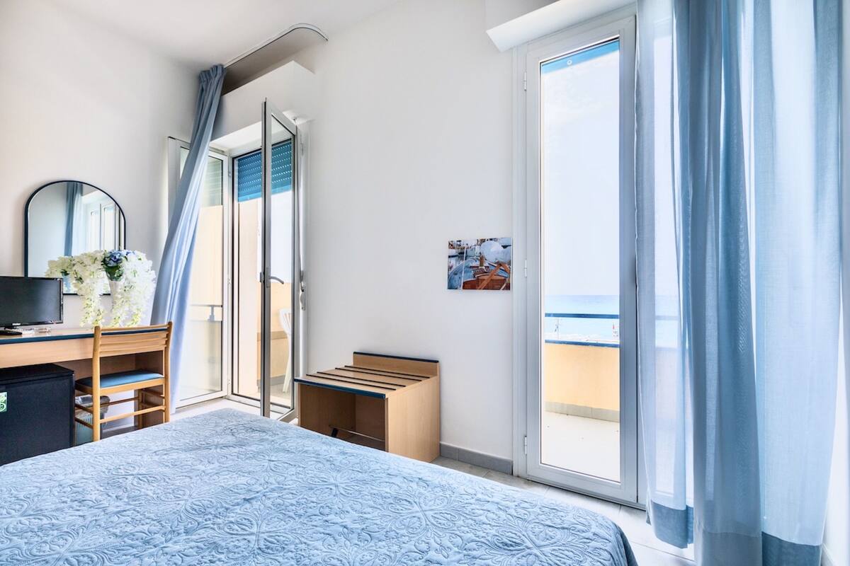 panoramic double room, sea view | minibar, in-room safe, desk, travel cot