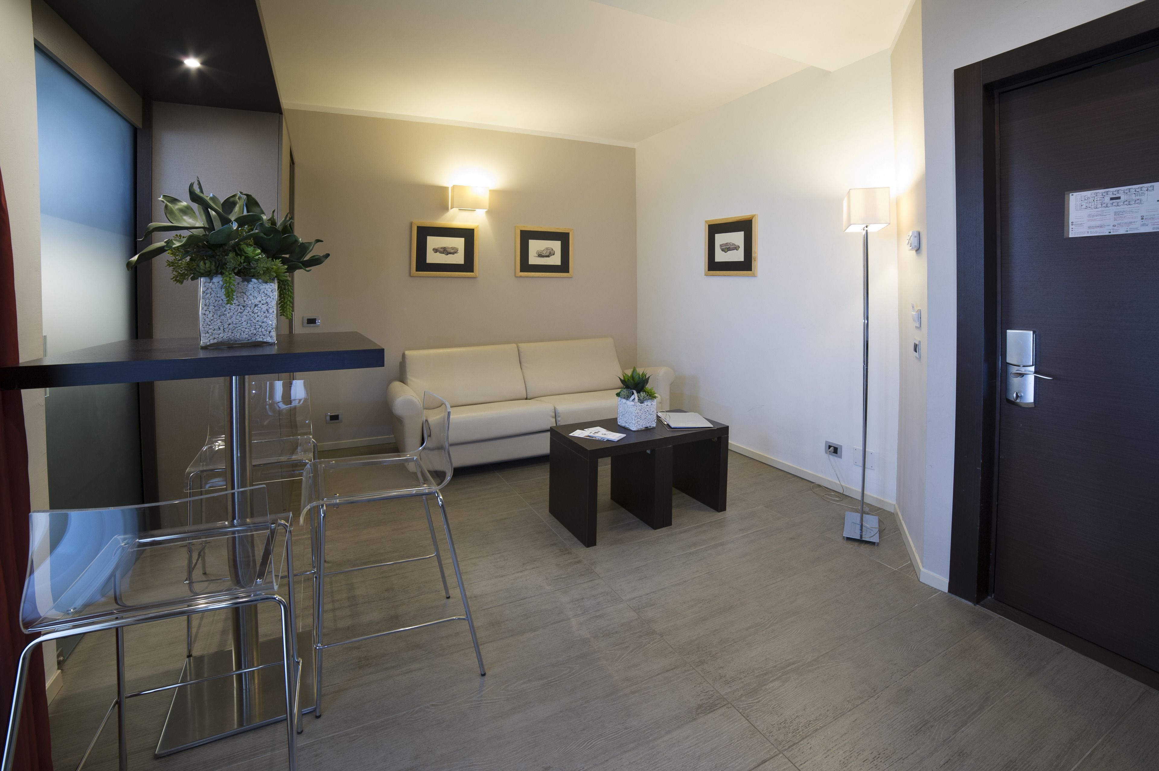 suite, 1 king bed, non smoking, kitchenette (living room;sofabed is a double bed) | living area | 32-inch tv with satellite channels