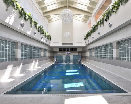 Seasonal outdoor pool, open 9:30 AM to 8:00 PM, pool umbrellas. Best Western Plus Hotel Modena Resort