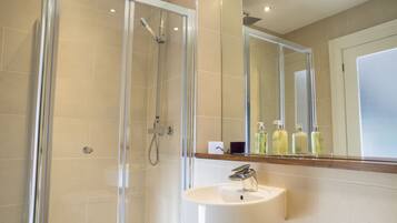 Shower, rainfall showerhead, designer toiletries, hair dryer