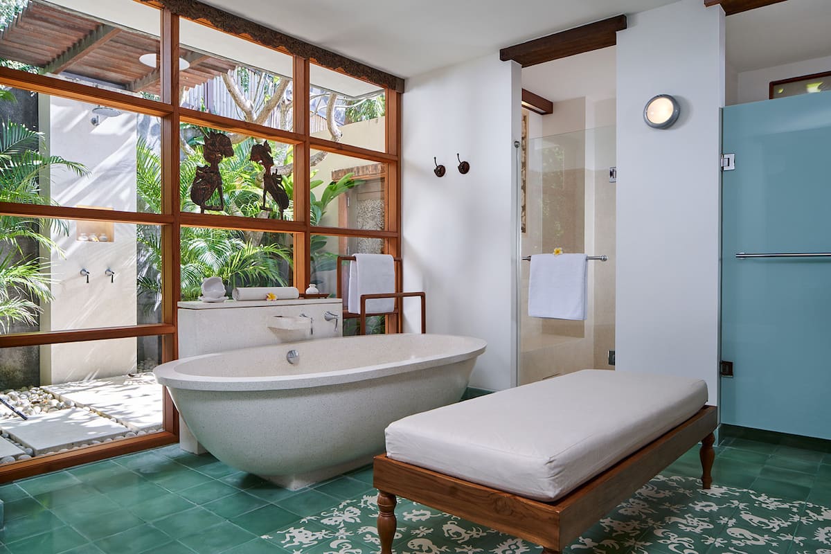 executive bungalow, garden area | bathroom | separate bathtub and shower, deep-soaking bathtub, free toiletries