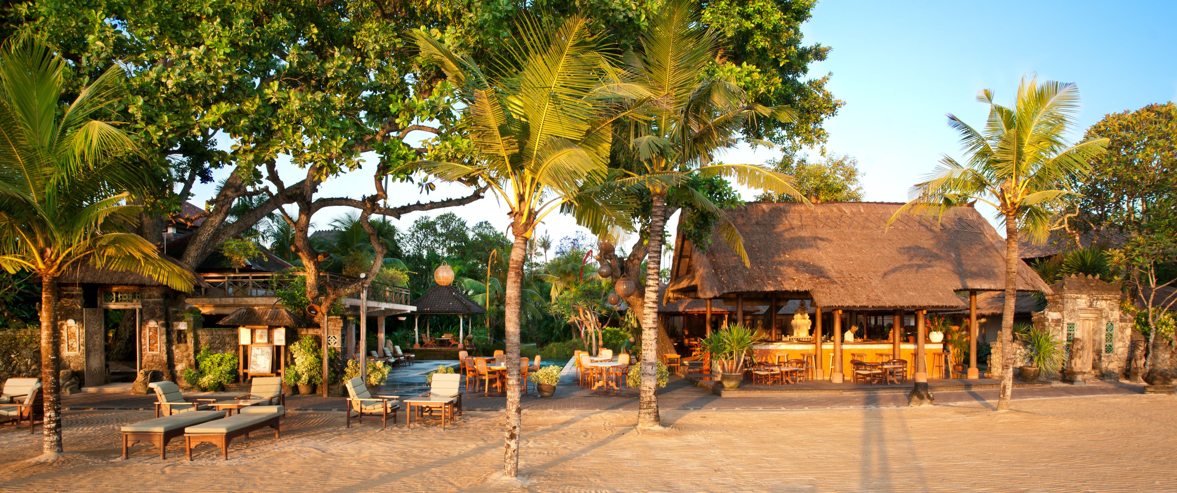 on the beach, white sand, free beach cabanas, sun-loungers