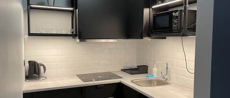 Appartement familial, 1 chambre | Cuisine privée | Réfrigérateur, four à micro-ondes, surface de cuisson, cafetiÚre-théiÚre