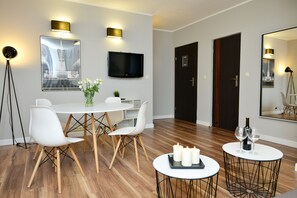Family Apartment, 1 Bedroom | 1 bedroom, down comforters, individually decorated - Apartamenty Top Garbary (Poznan)