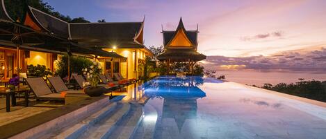 Outdoor pool, pool umbrellas, sun loungers