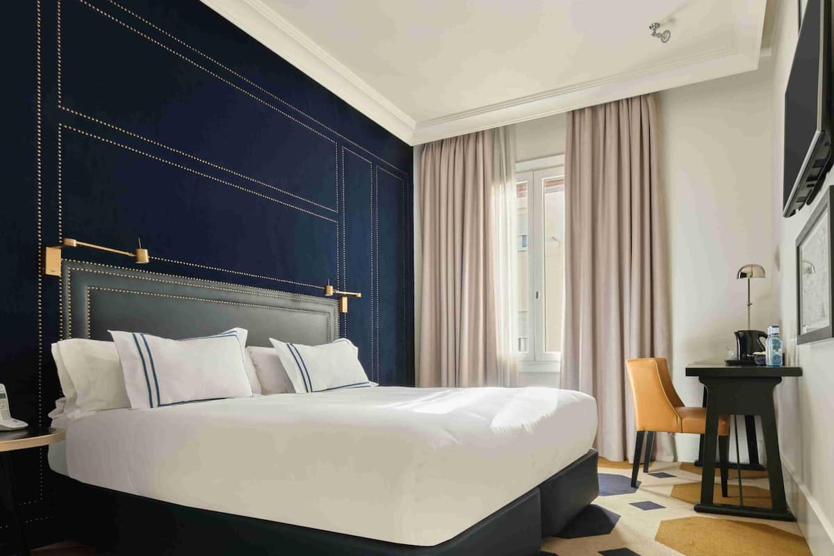 1 Schlafzimmer, hochwertige Bettwaren, Daunenbettdecken, Minibar