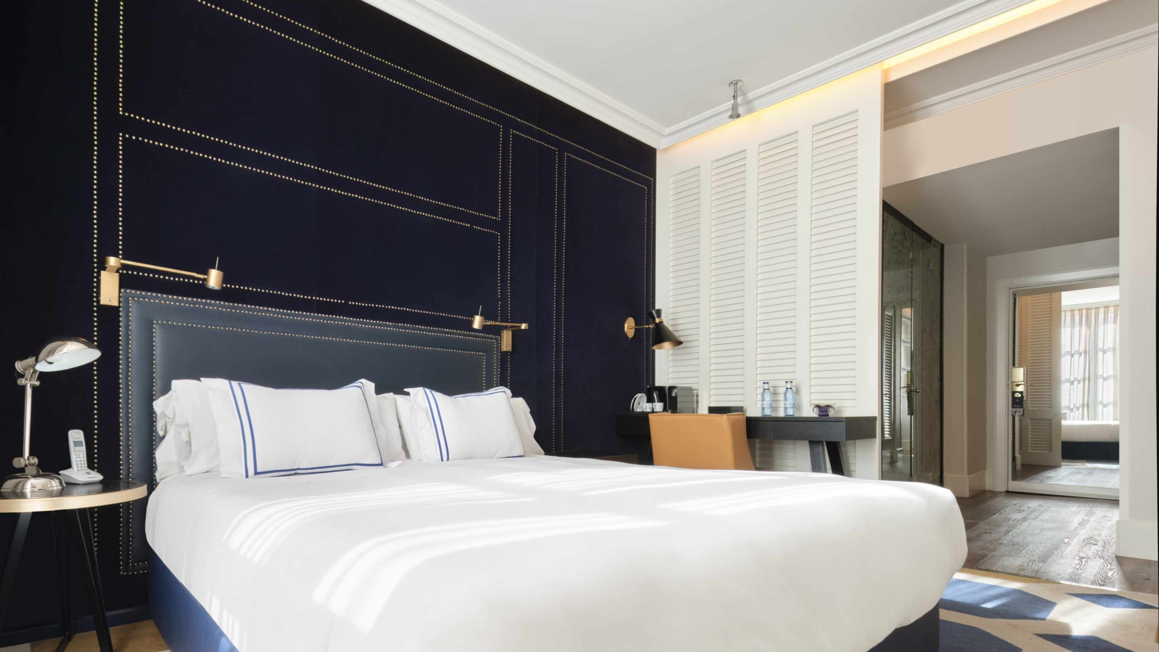 Premium bedding, down comforters, minibar, in-room safe