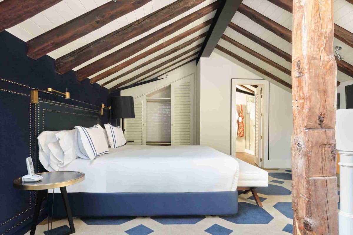 1 Schlafzimmer, hochwertige Bettwaren, Daunenbettdecken, Minibar
