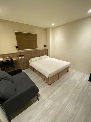 Habitación Elite doble | Edredones de plumas, cortinas opacas, wifi gratis y ropa de cama