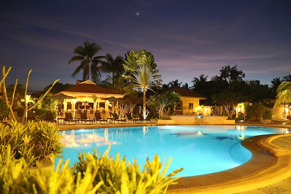 Outdoor pool, pool umbrellas, sun loungers