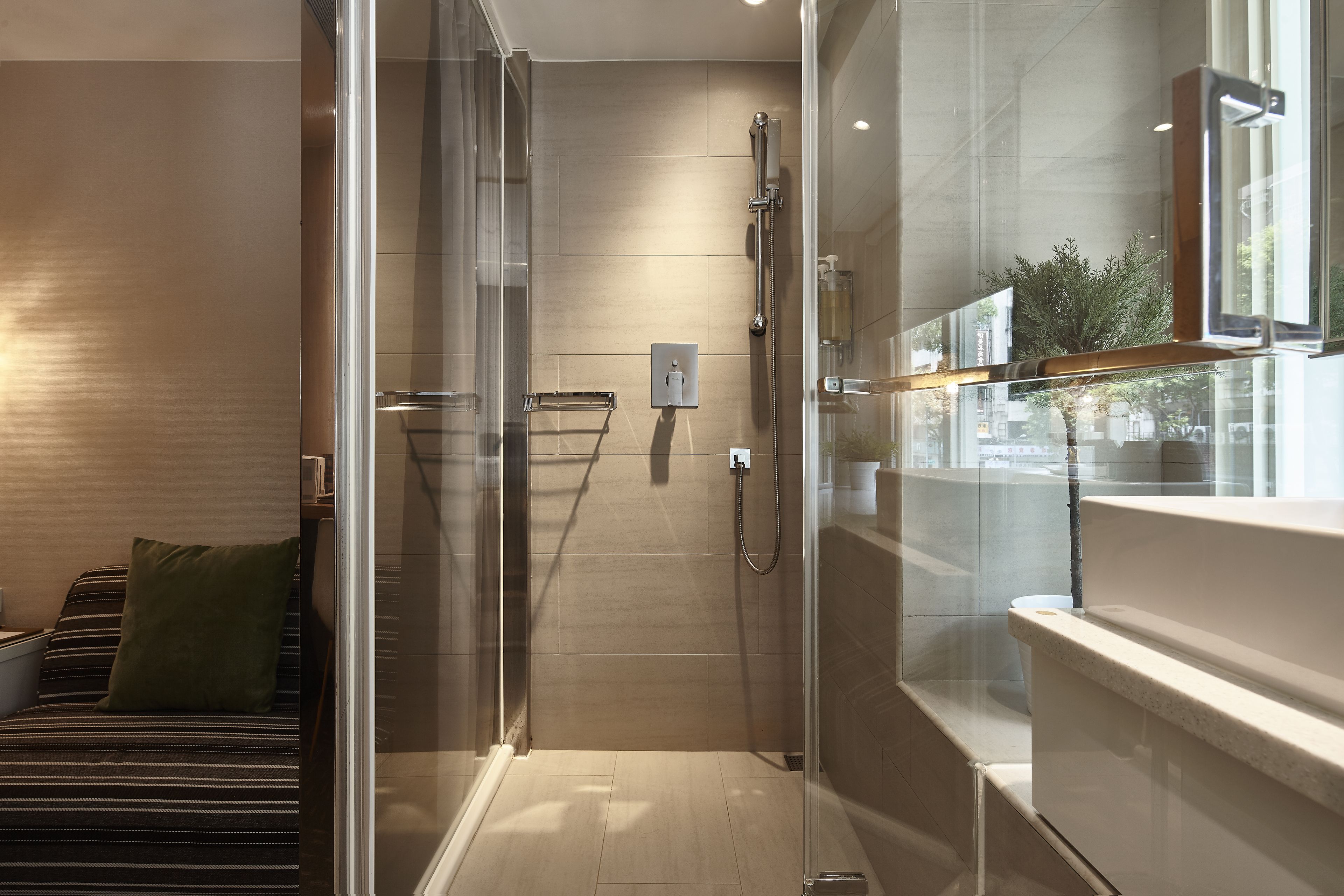 deluxe double room | bathroom | shower, rainfall showerhead, hair dryer, slippers