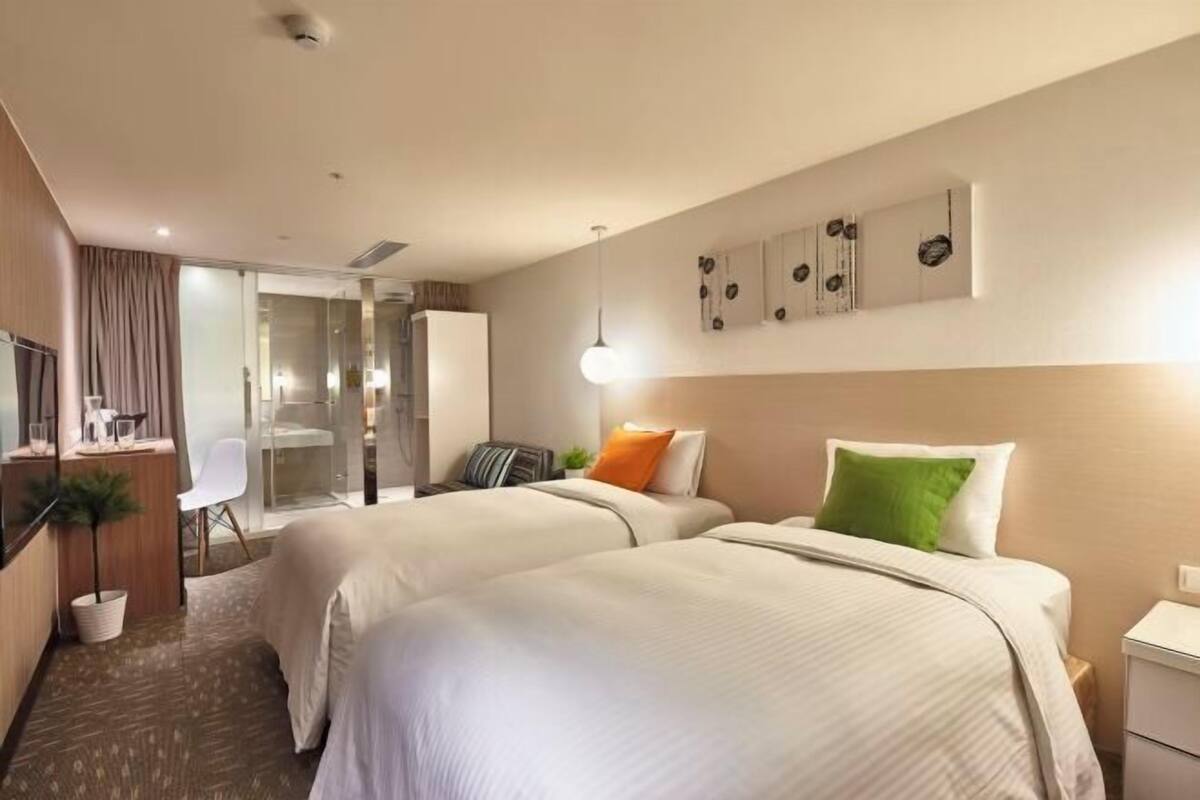 Premium bedding, down duvets, in-room safe, desk