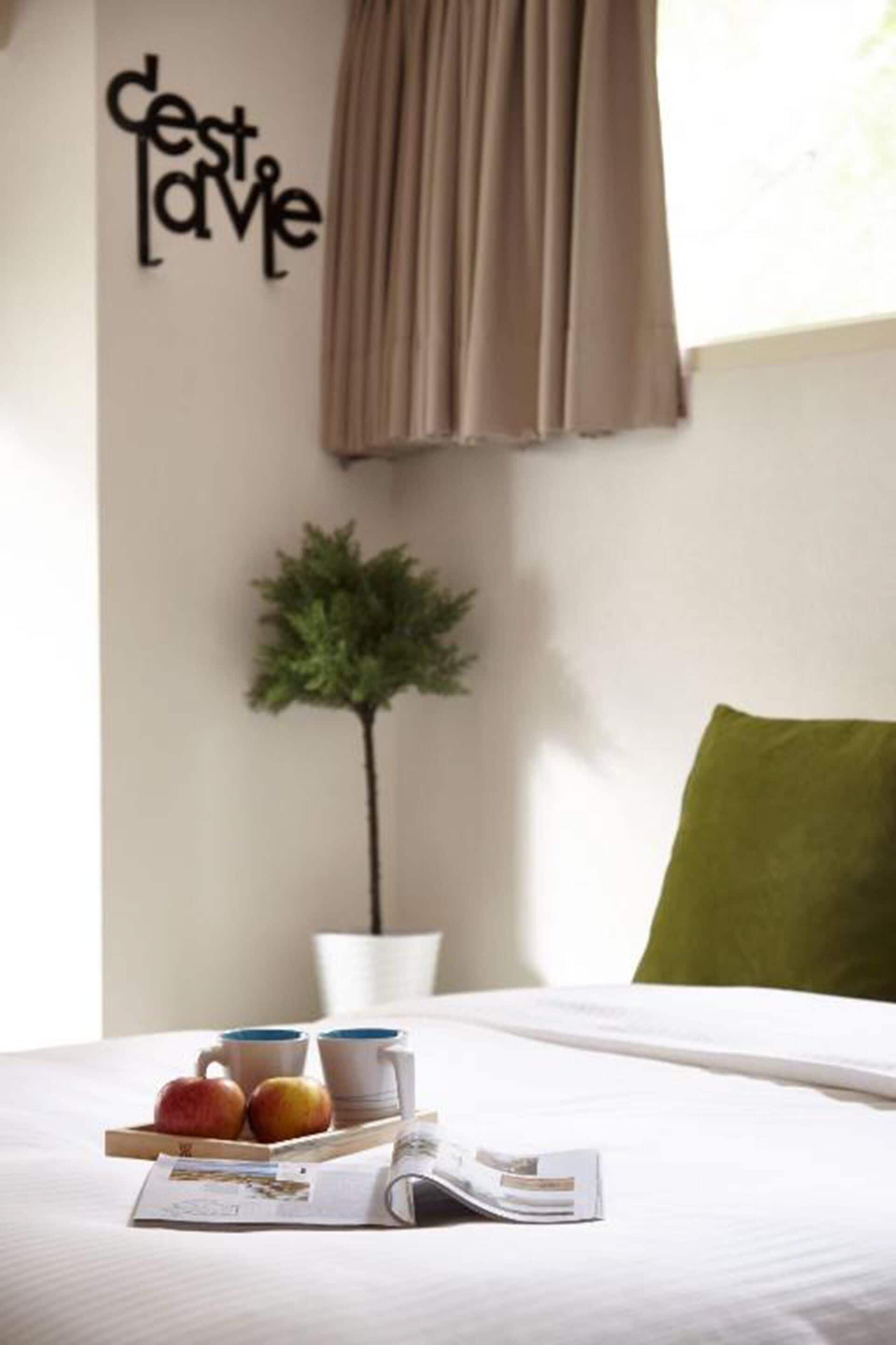 deluxe triple room | premium bedding, down duvets, in-room safe, blackout curtains