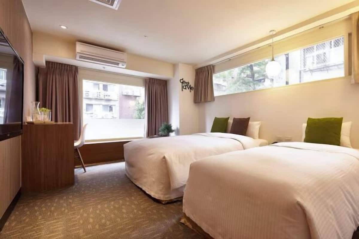 Premium bedding, down duvets, in-room safe, desk