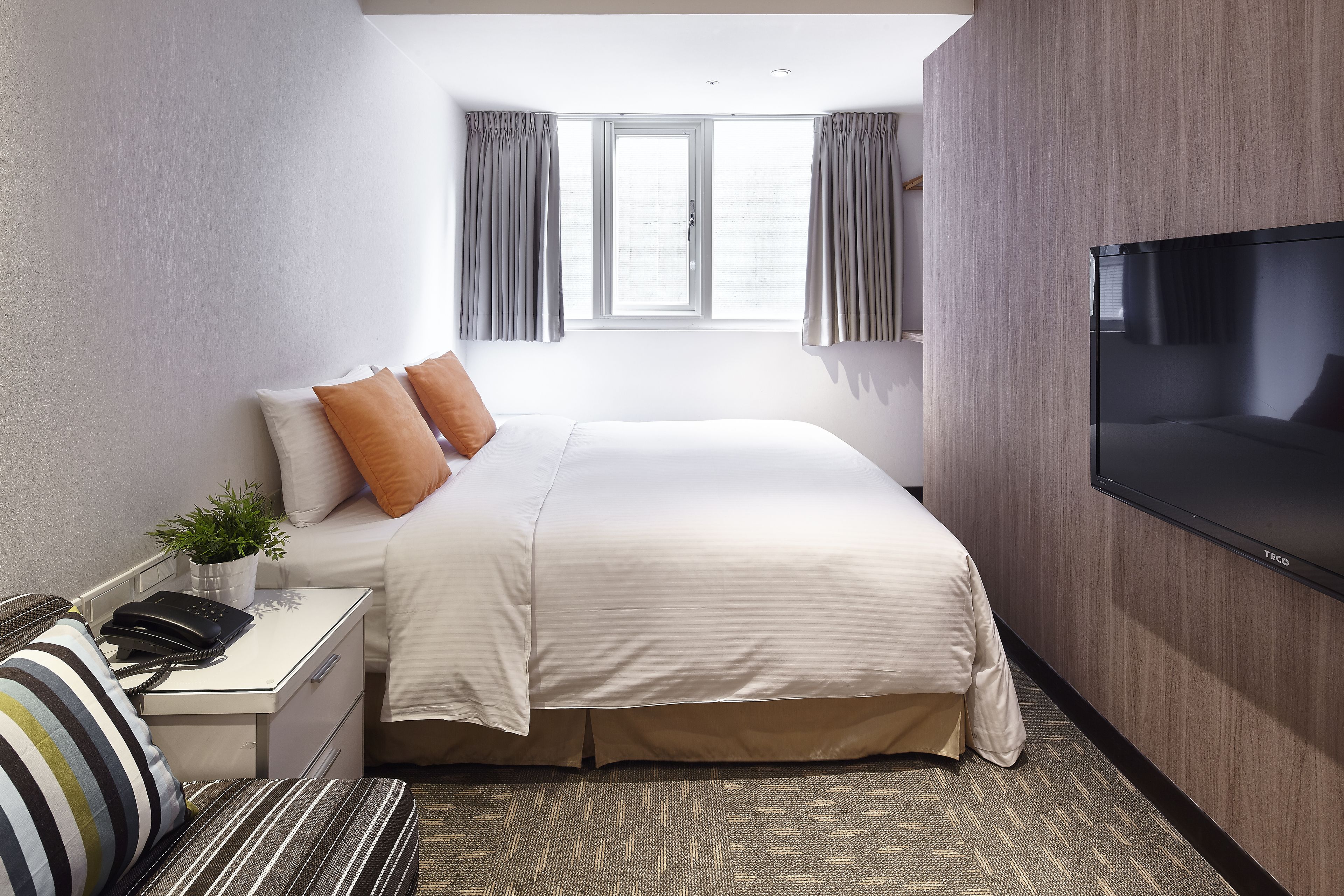 deluxe double room | premium bedding, down duvets, in-room safe, blackout curtains