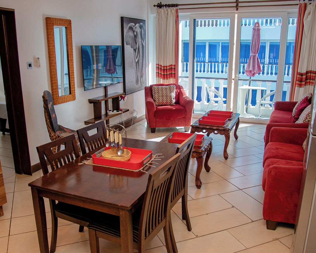 Apartment, 1 Bedroom | Living area | 43-inch flat-screen TV with satellite channels, TV