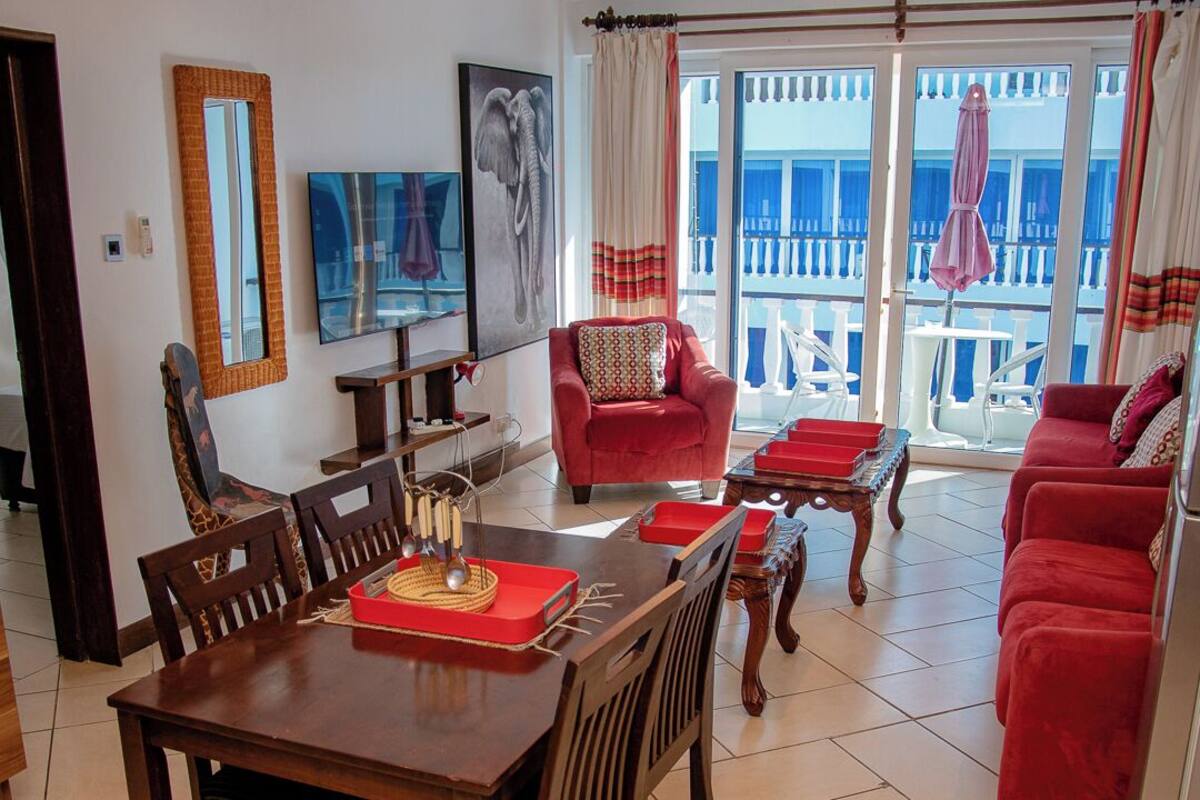 Apartment, 1 Bedroom | Living area | 43-inch flat-screen TV with satellite channels, TV