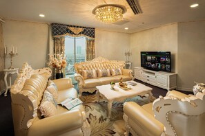 President Suite Room | Living area | 37-inch LCD TV with cable channels, TV, computer monitors - Super Candle Hotel (Hanoi)