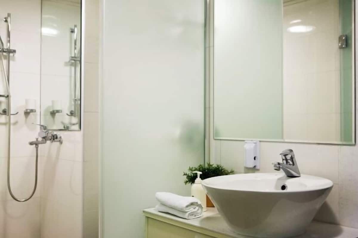 Bathroom | Shower, free toiletries, hair dryer, bathrobes