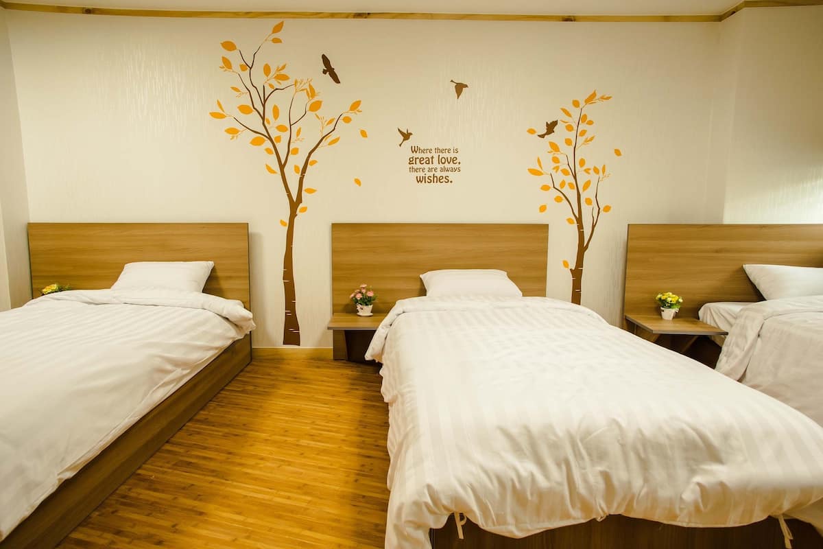 Shared Dormitory, Women only (3 beds) (Private shower booth & shared toilet) | Premium bedding, pillowtop beds, rollaway beds (surcharge), WiFi (free)