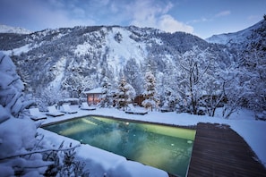 Outdoor pool, open 8:00 AM to 8:00 PM, pool loungers