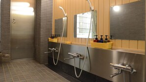 A modern bathroom with two sinks, a mirror, and a shower. - Ryokan Kyo-no-yado Kagihei (Kyoto)