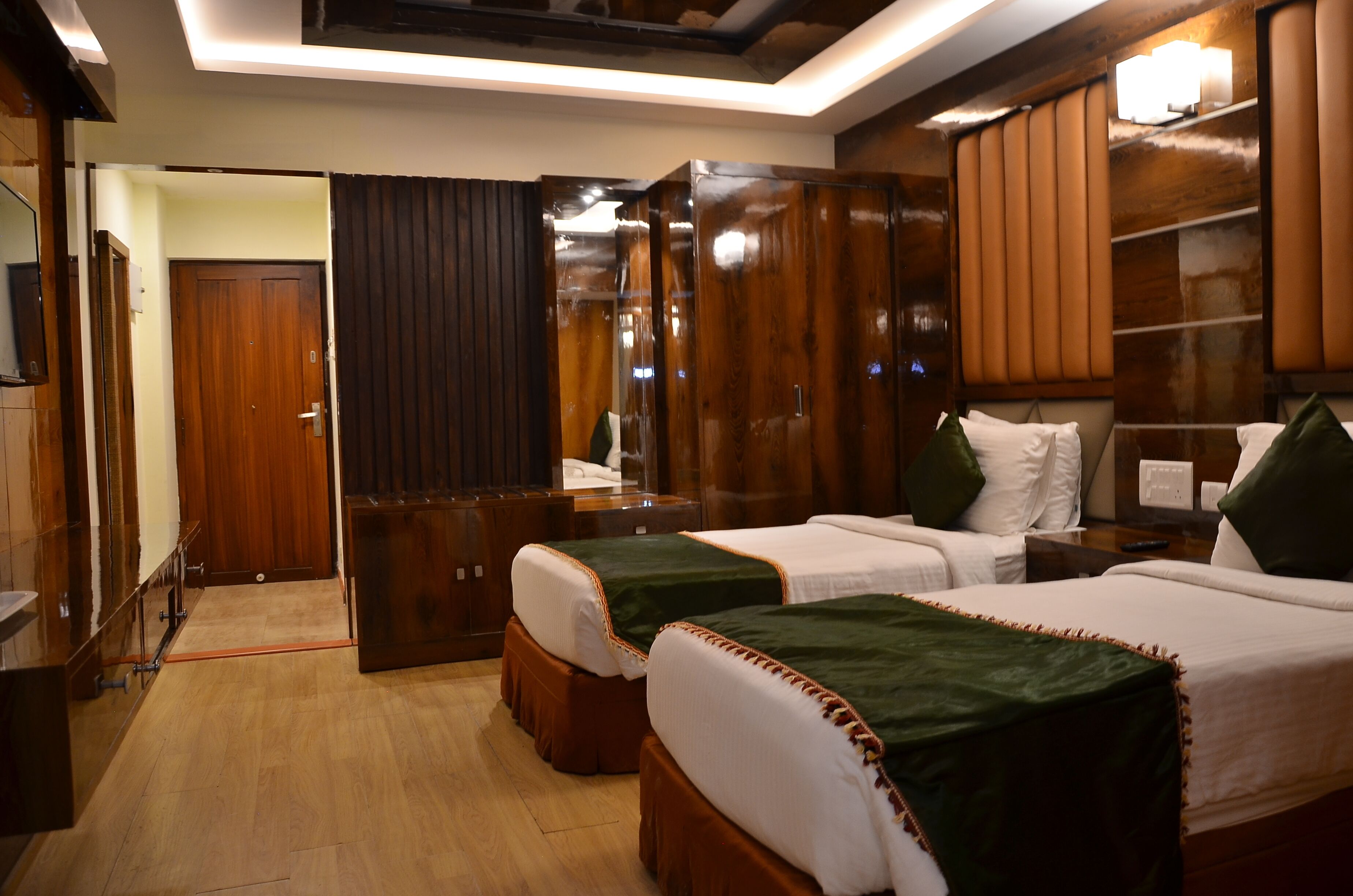 Executive Room | Pillow-top beds, in-room safe, individually decorated