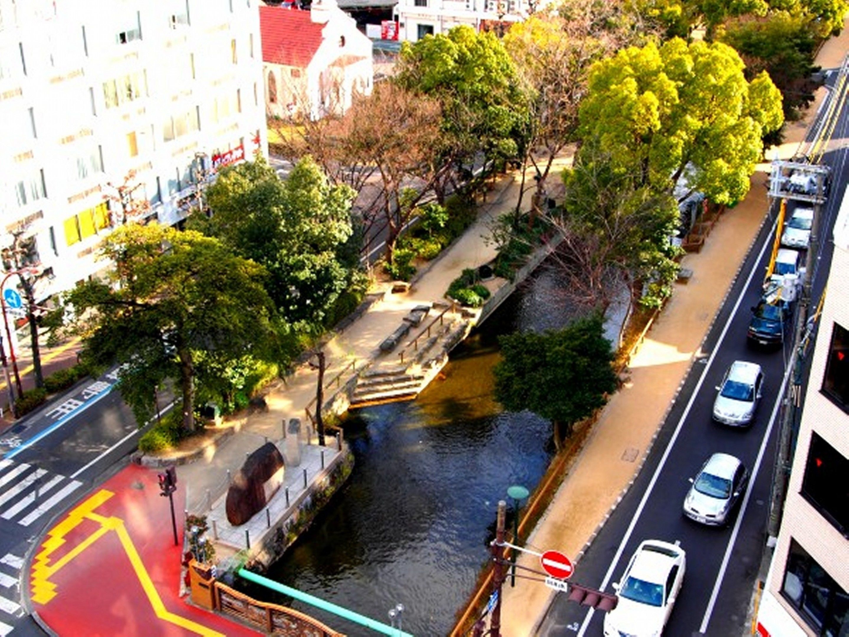 A river running through a city with buildings on both sides.