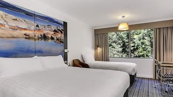 Deluxe Room, Multiple Beds | Premium bedding, down comforters, minibar, desk