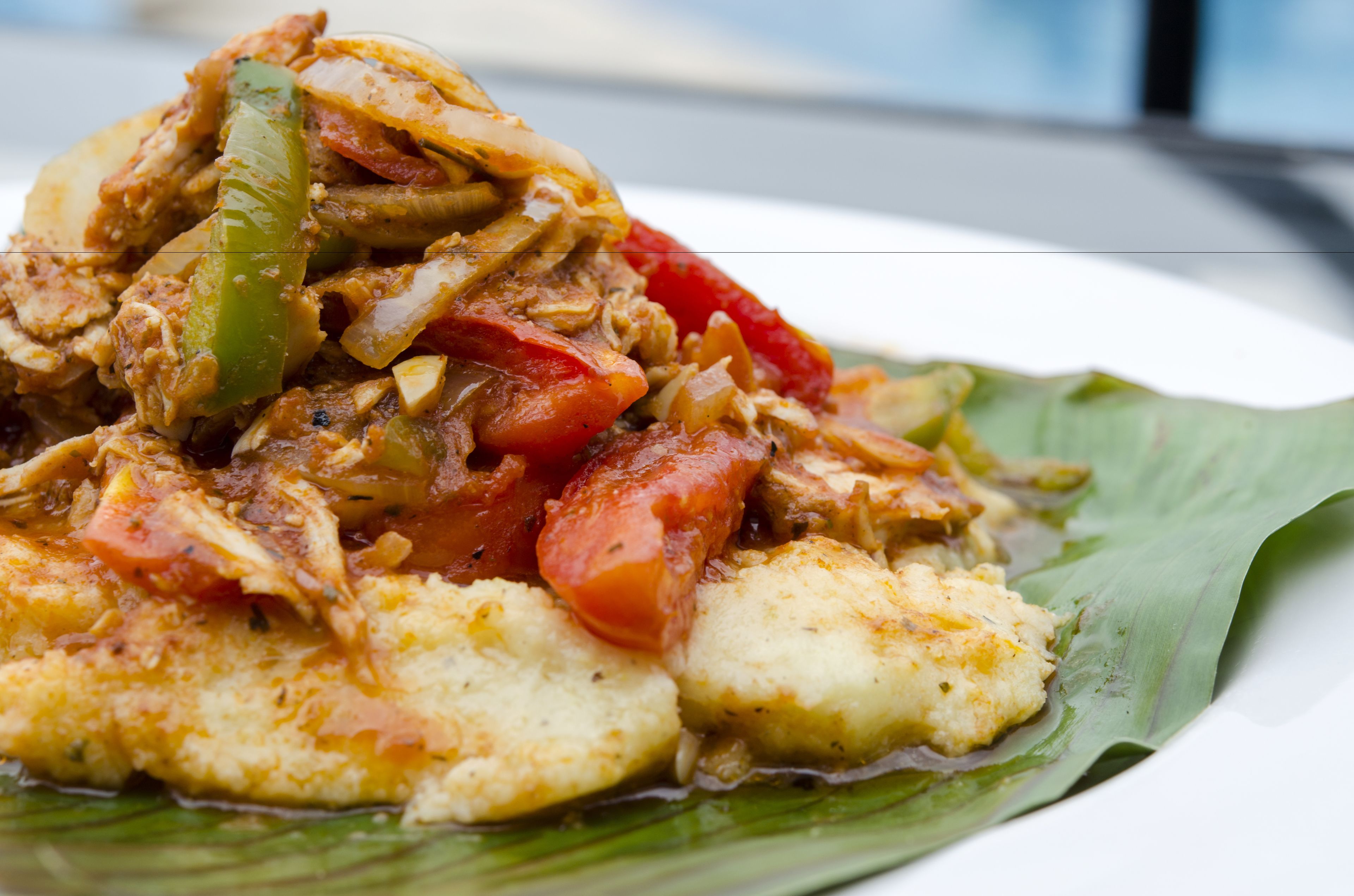 A dish of food served on a banana leaf.