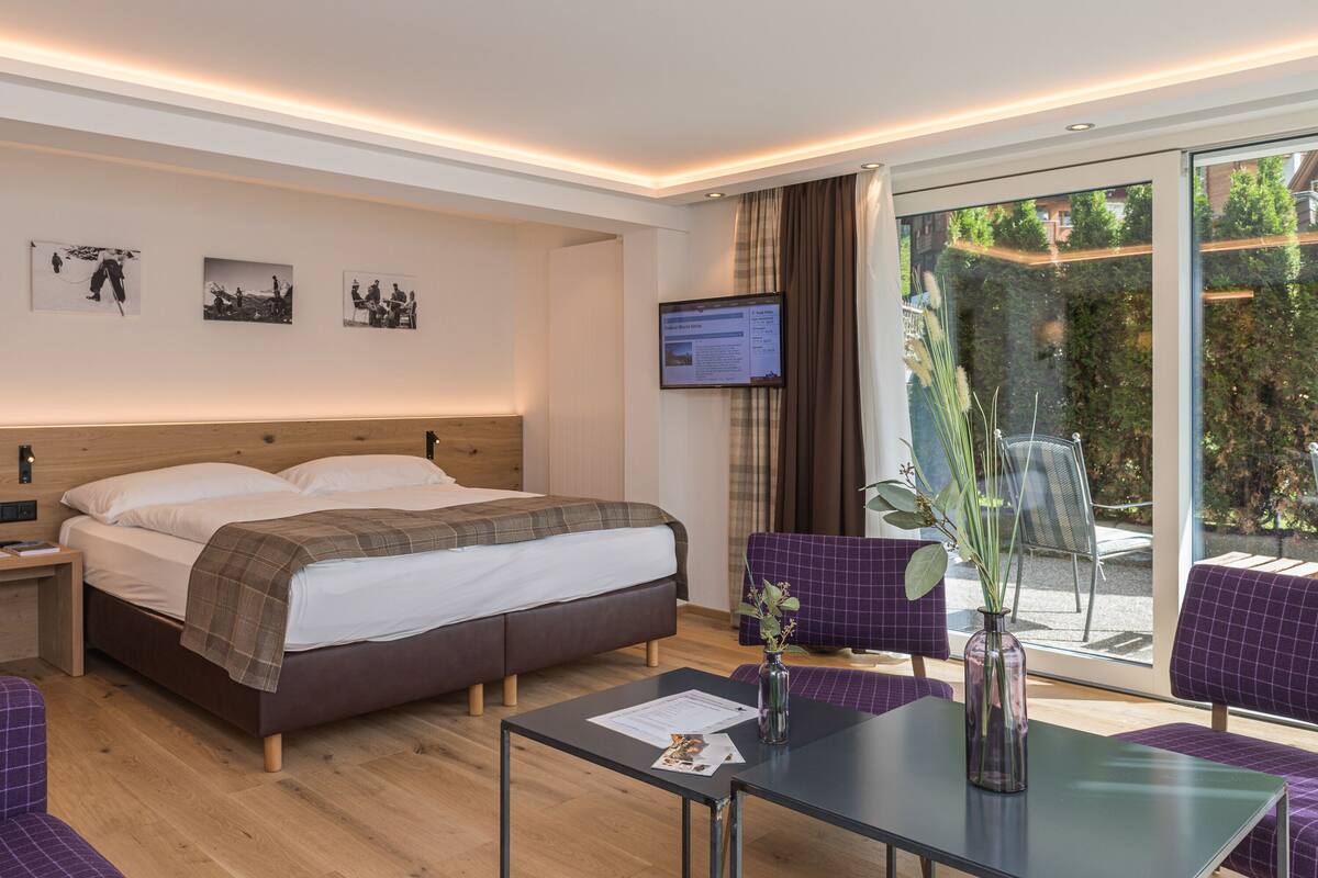 Junior Double Room, Patio, Mountain View | Hypo-allergenic bedding available, in-room safe, soundproofing